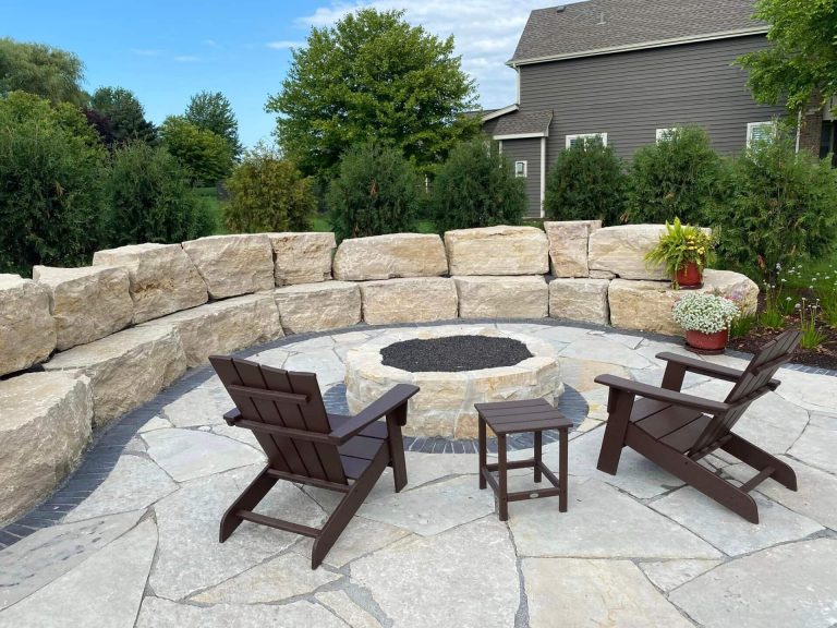 Phot of a brick paver patio with firepit