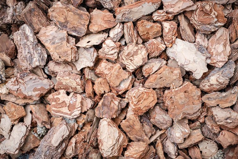 Top-down closeup photo of pine bark chips nuggets